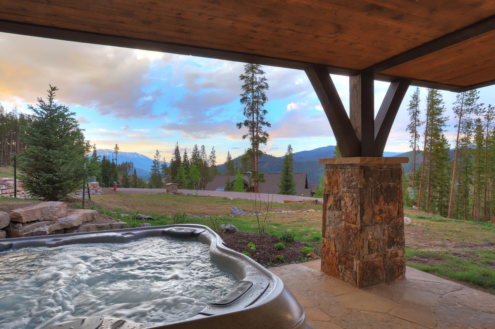 Mountain style home design photo in Denver
