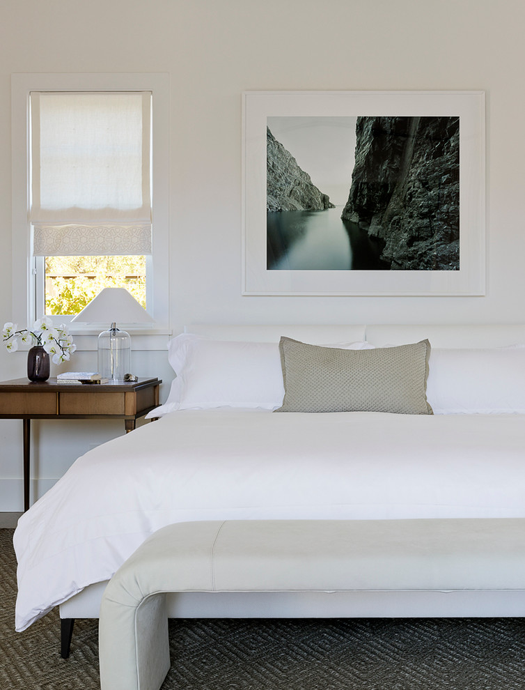 Inspiration for a transitional master bedroom in San Francisco with white walls.