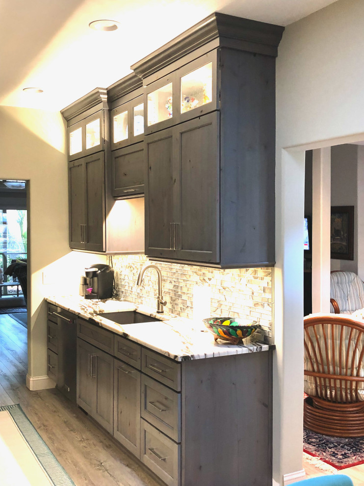 This is an example of a transitional kitchen in Atlanta.