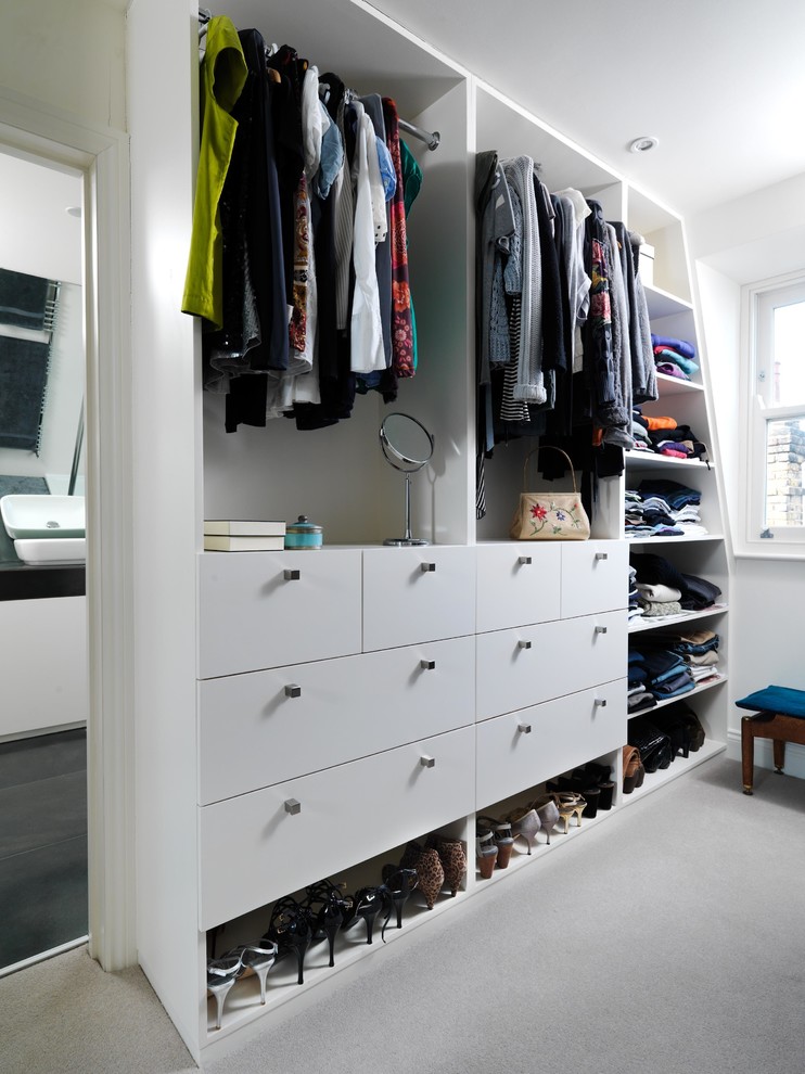 This is an example of a transitional storage and wardrobe in London.