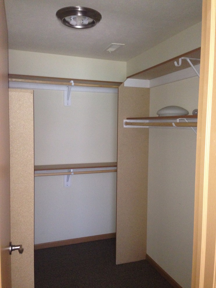 Photo of a contemporary storage and wardrobe in Omaha.
