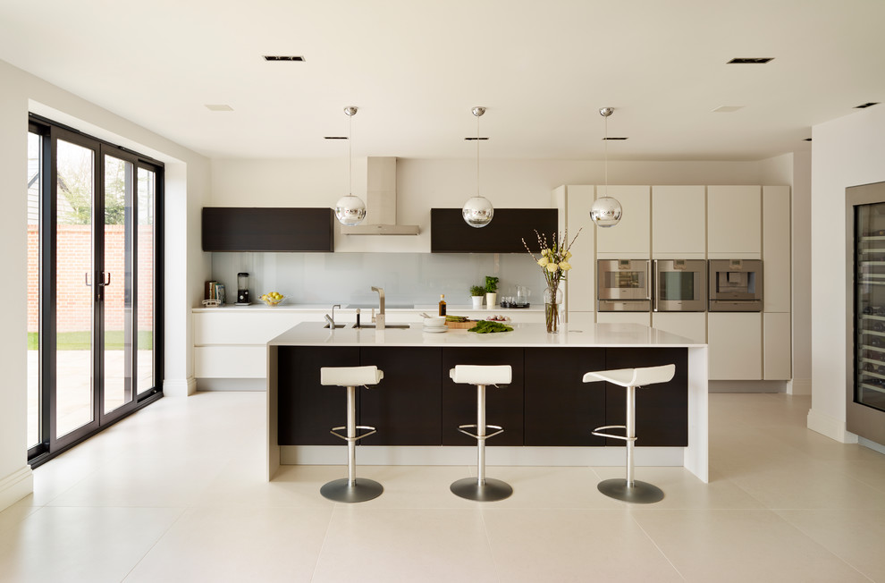 Contemporary kitchen in Essex with with island.
