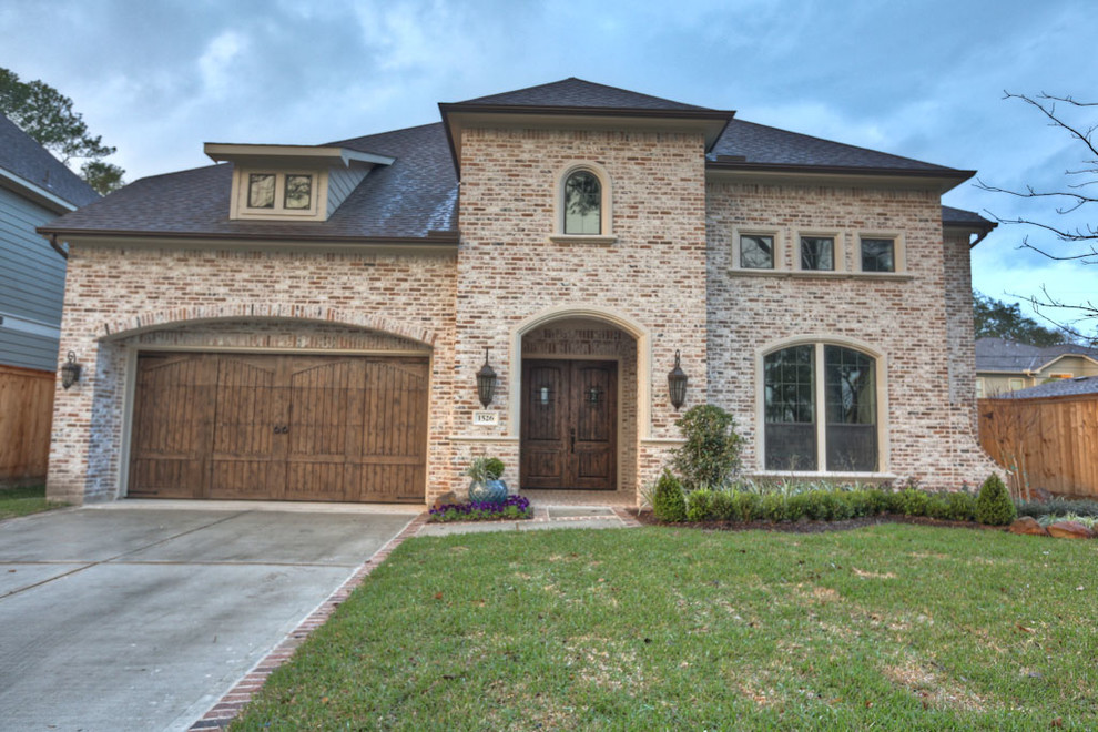 Example of a transitional exterior home design in Houston