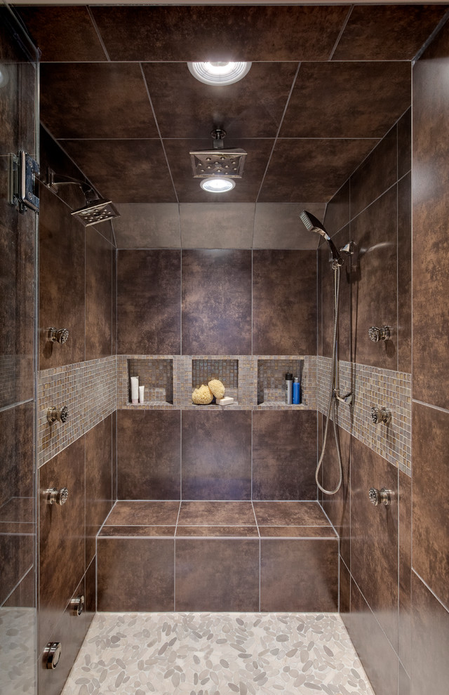 Photo of a contemporary bathroom in Chicago with a double shower, a niche and a shower seat.