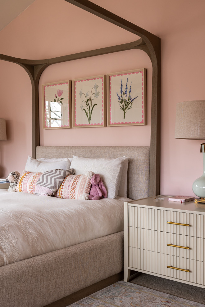 Example of a huge transitional kids' room design in Salt Lake City with pink walls