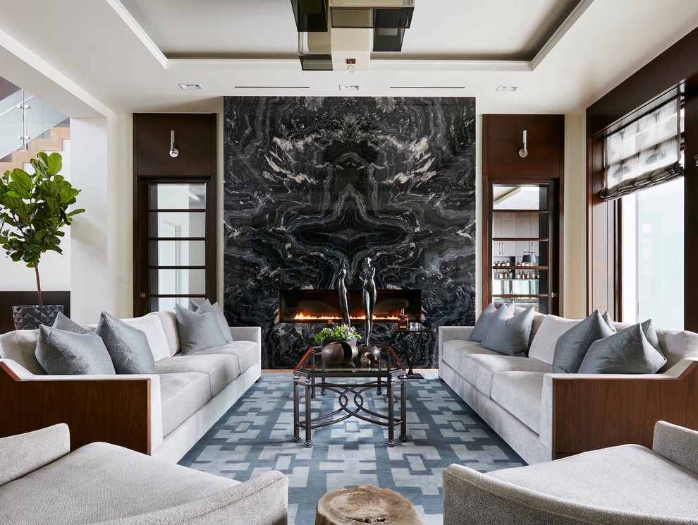 Inspiration for a large modern formal open concept living room in Miami with white walls, light hardwood floors, a ribbon fireplace, a stone fireplace surround and no tv.