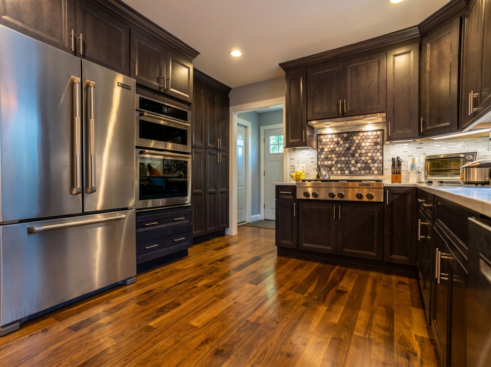 Kitchen with Gray-Stained Cabinetry & Pro Range
