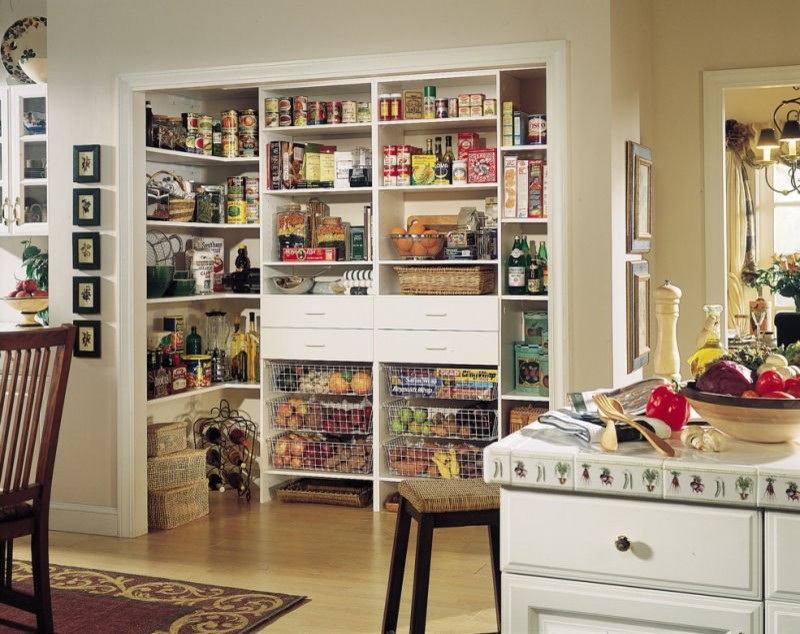 Traditional kitchen pantry in Other.