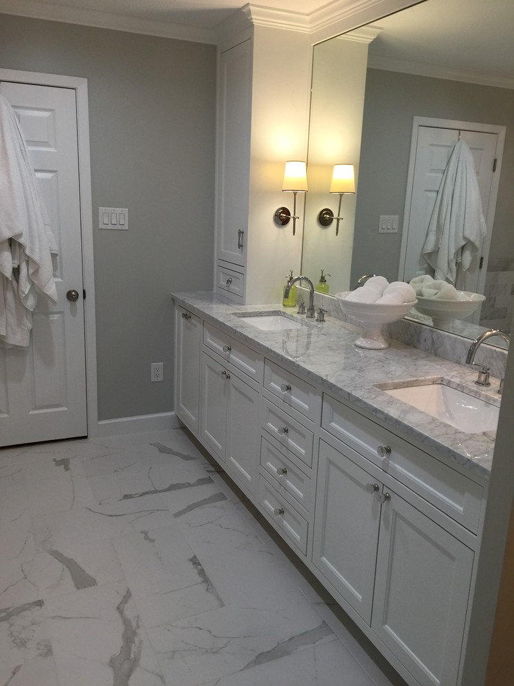 Photo of a mid-sized transitional master bathroom in Dallas with recessed-panel cabinets, white cabinets, a freestanding tub, an alcove shower, a two-piece toilet, grey walls, an undermount sink, quartzite benchtops, yellow floor and a hinged shower door.