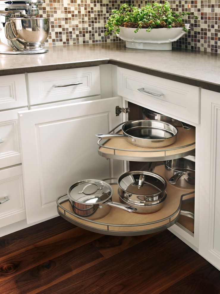 Kitchen - transitional dark wood floor and brown floor kitchen idea with recessed-panel cabinets, white cabinets, multicolored backsplash and mosaic tile backsplash