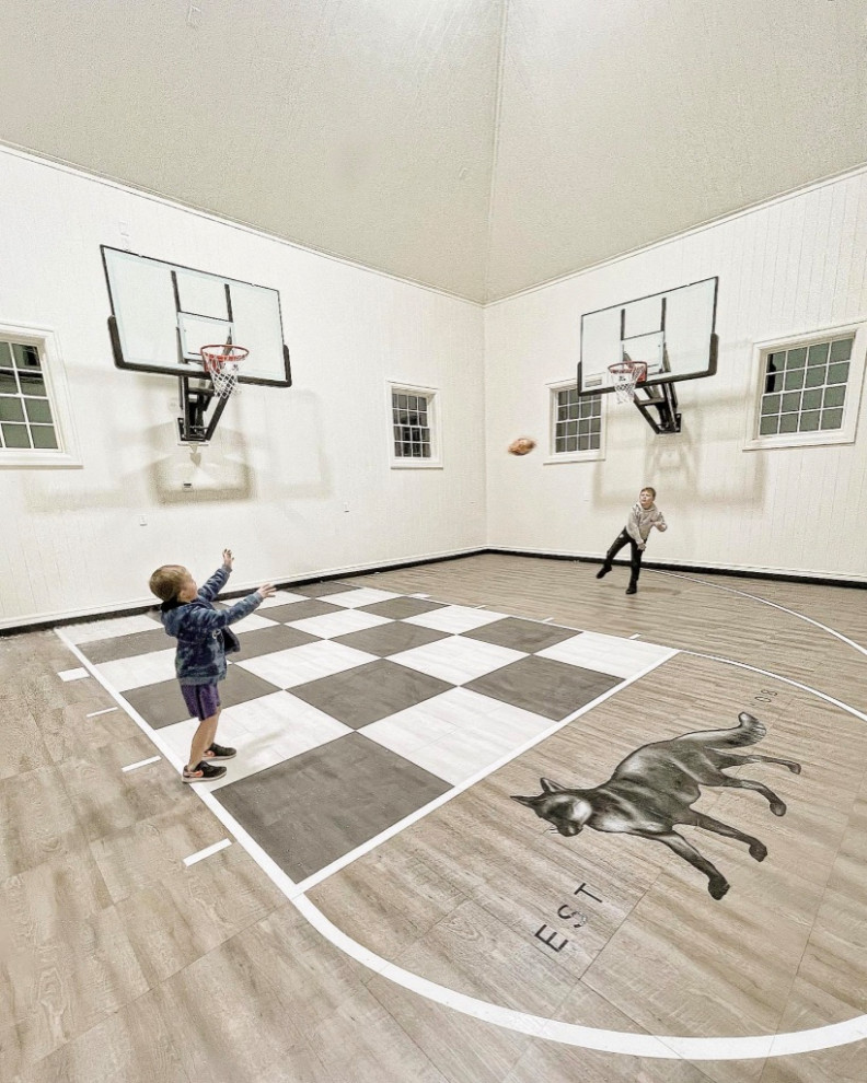 Inspiration for a medium sized indoor sports court in Salt Lake City with white walls.