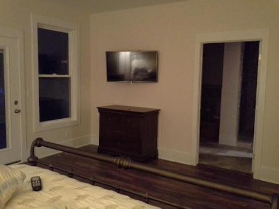 Bedroom - small transitional master bedroom idea in Charleston with beige walls