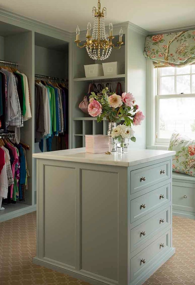 Inspiration for a mid-sized traditional women's dressing room in Los Angeles with shaker cabinets, carpet, green cabinets and beige floor.