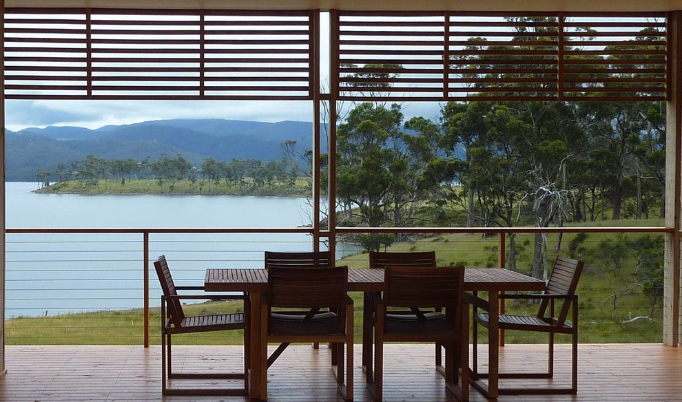 Design ideas for a large contemporary courtyard patio in Hobart with decking and a roof extension.