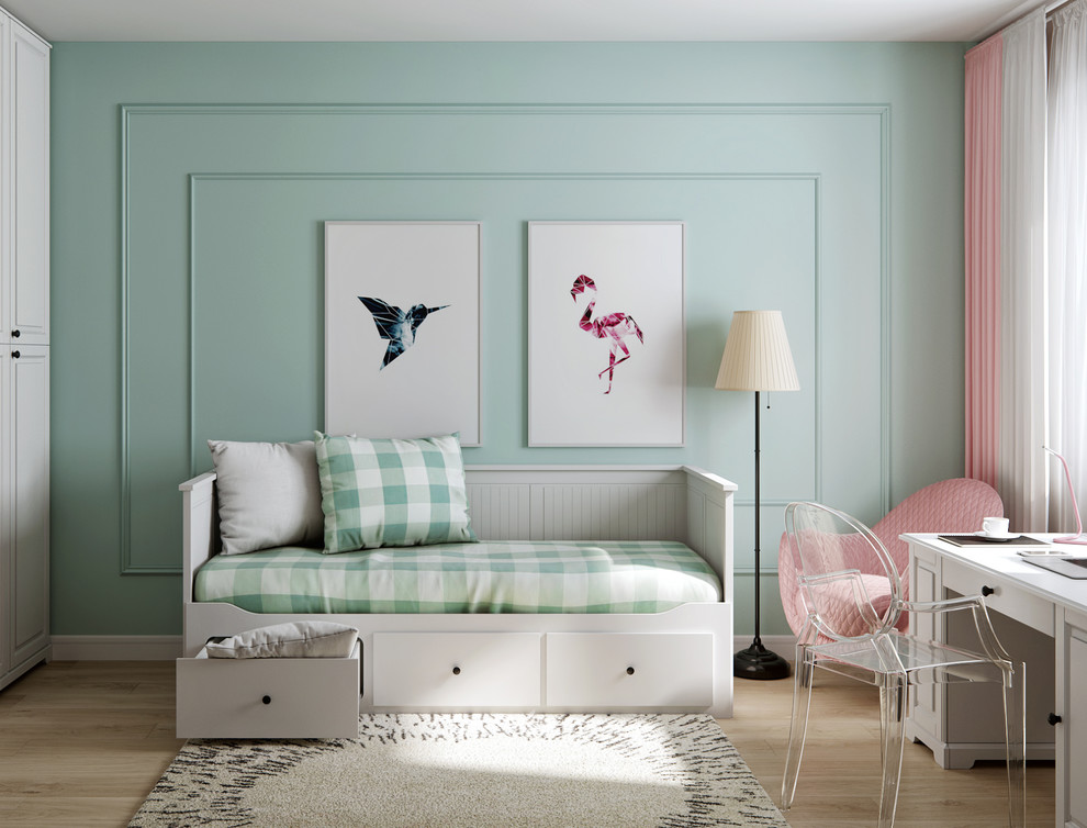 Inspiration for a beach style kids' room for girls in Valencia with light hardwood floors, beige floor and green walls.