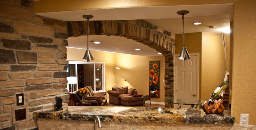 Mountain style basement photo in Denver