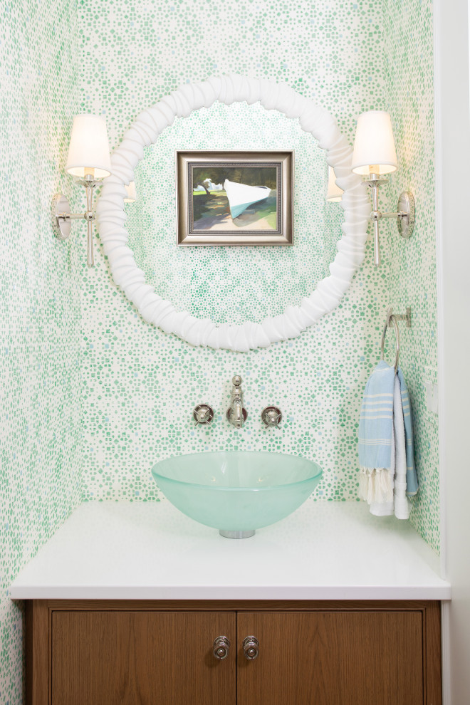 This is an example of a beach style powder room in Other.