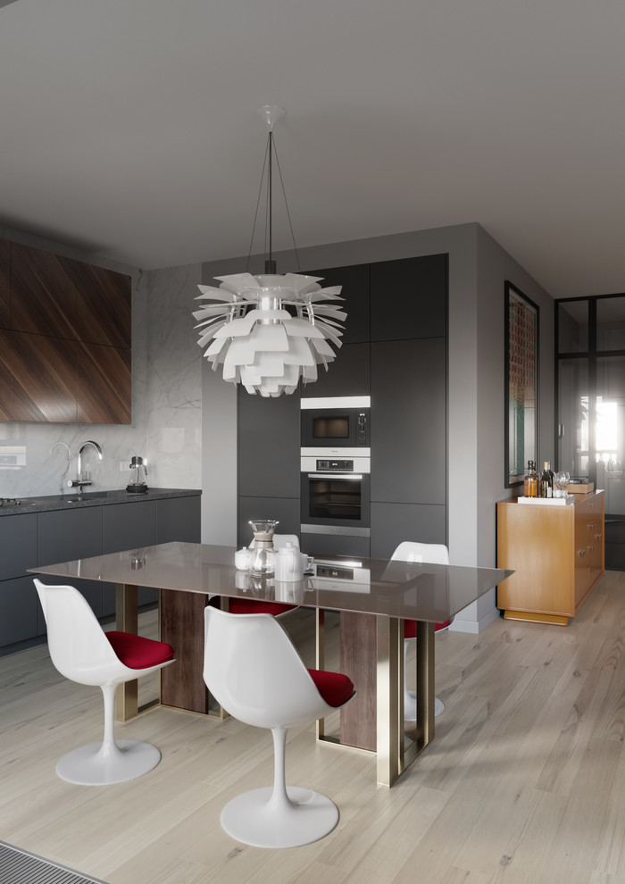Contemporary single-wall open plan kitchen in Moscow with flat-panel cabinets, grey cabinets, light hardwood floors, no island and beige floor.