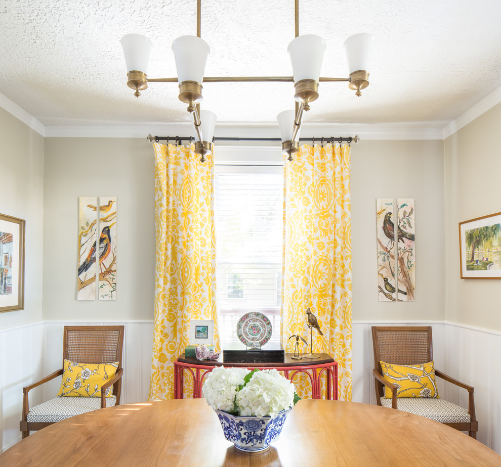 Inspiration for a mid-sized transitional separate dining room in Chicago with beige walls and no fireplace.