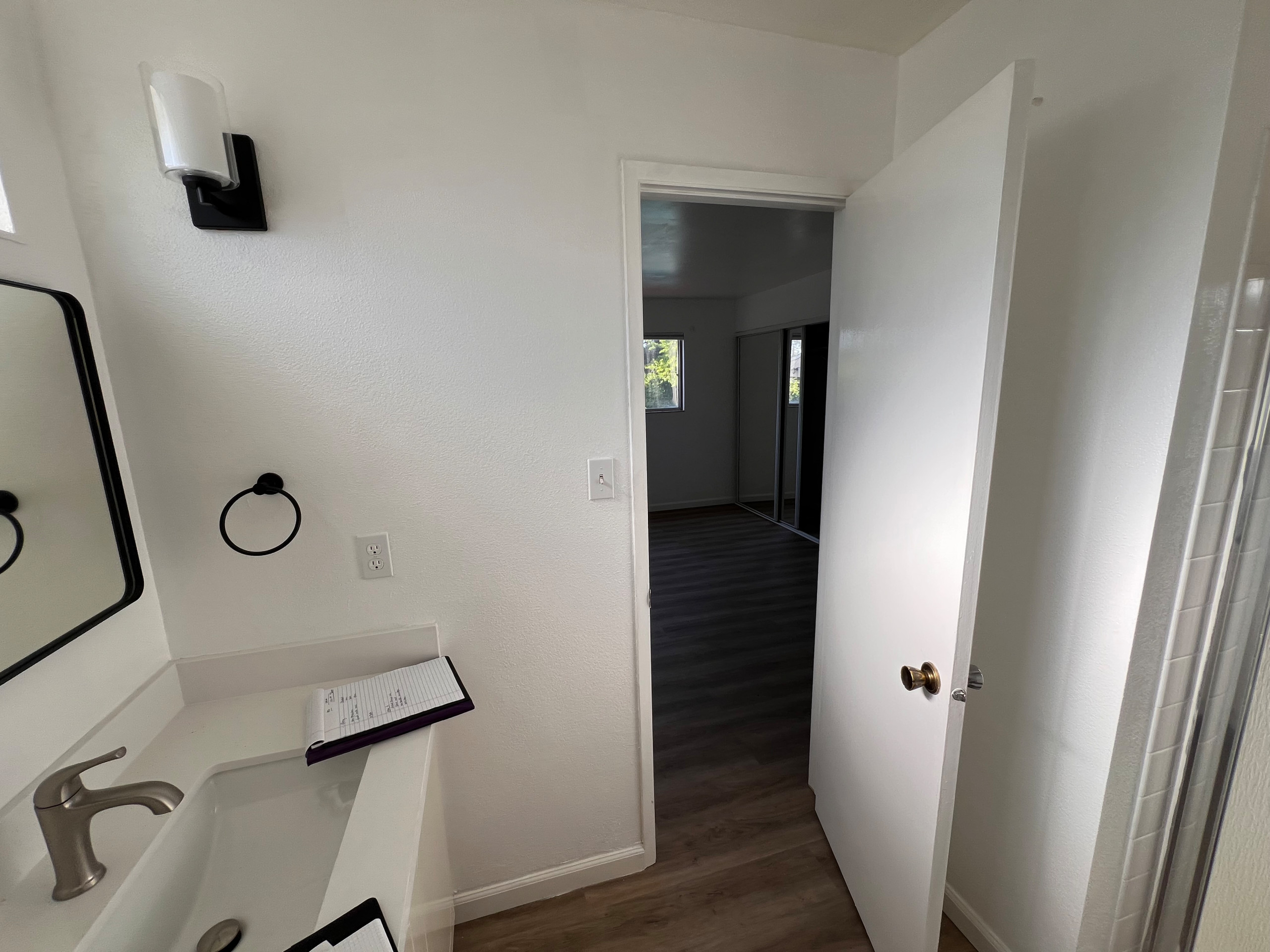 BEFORE! Existing Door is Replaced with a Pocket Door for Added Space