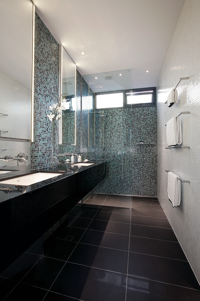 Mid-sized modern master bathroom in Melbourne with an undermount sink, flat-panel cabinets, black cabinets, engineered quartz benchtops, a freestanding tub, an alcove shower, multi-coloured tile, stone slab, multi-coloured walls and porcelain floors.