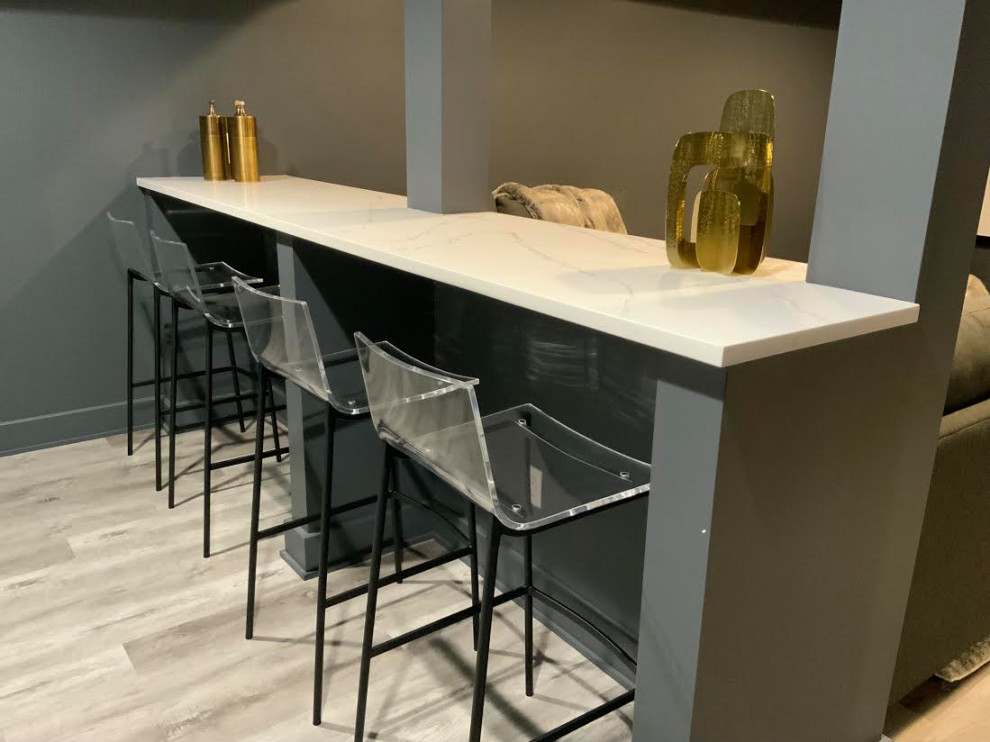 A Transitional Fun Family Basement with Bathroom, Gym, Movie Room and Gaming Ar