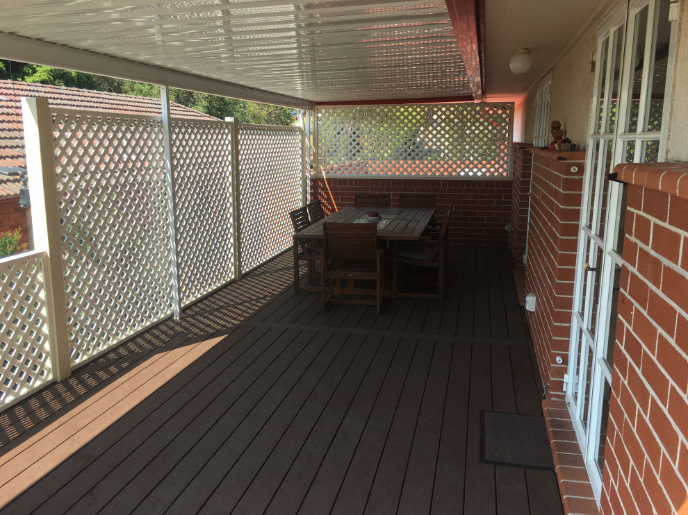 This is an example of a large contemporary deck in Sydney.