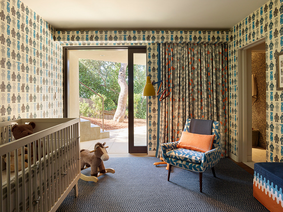 Photo of an eclectic nursery for boys in San Francisco with multi-coloured walls and carpet.