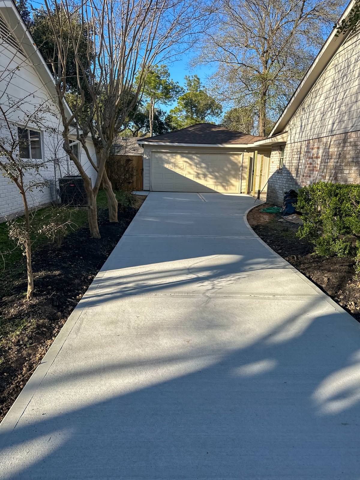 New driveway with sidewalks and stamped concrete!