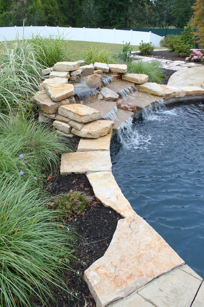 Inspiration for a rustic pool remodel in Boston