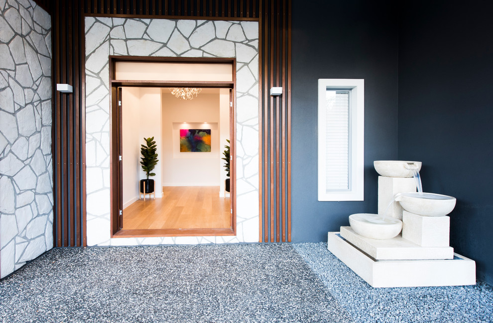 This is an example of a contemporary entryway in Brisbane.