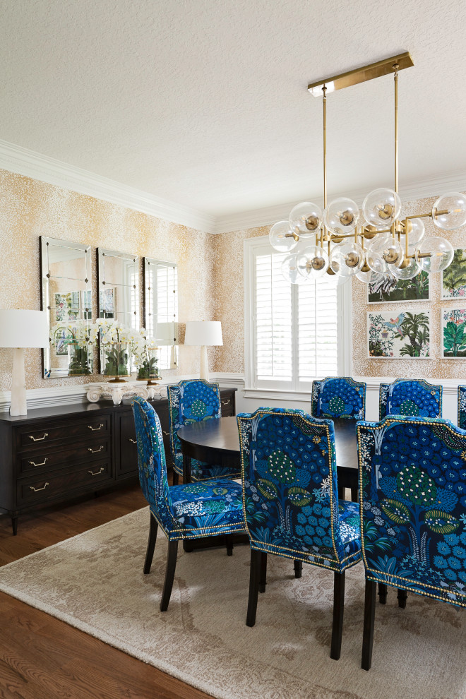 Inspiration for a large transitional separate dining room in Orlando with multi-coloured walls, light hardwood floors, no fireplace and brown floor.