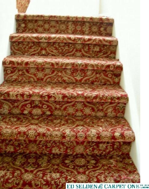 Mid-sized transitional carpeted straight staircase in Seattle with carpet risers.
