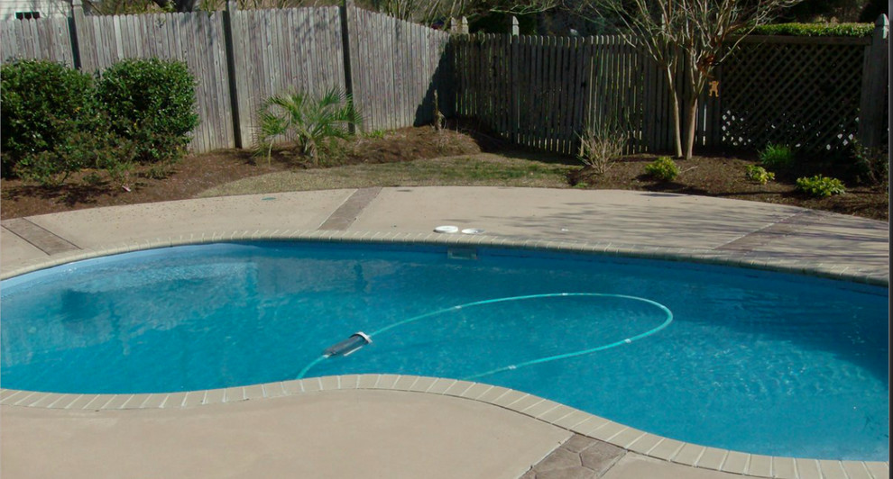 Inspiration for a small transitional backyard concrete paver and custom-shaped pool remodel in Phoenix
