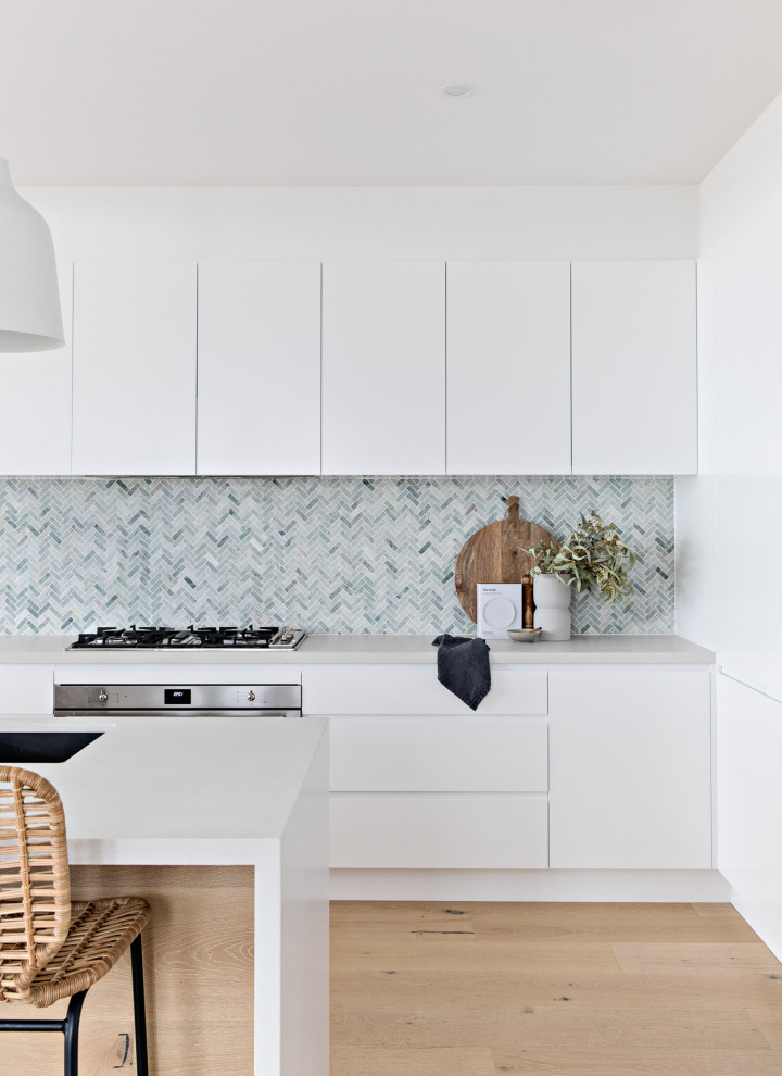 This is an example of a beach style kitchen in Wollongong.