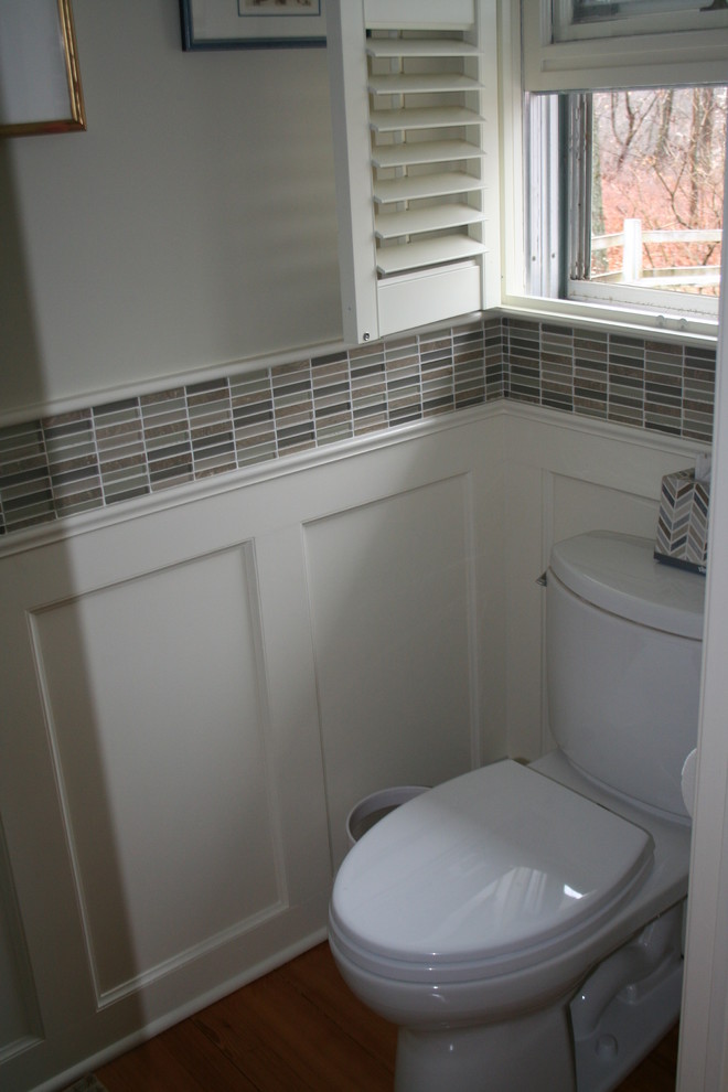 Small transitional 3/4 bathroom in Providence with an undermount sink, open cabinets, green cabinets, marble benchtops, a two-piece toilet, green tile, mosaic tile, green walls and light hardwood floors.