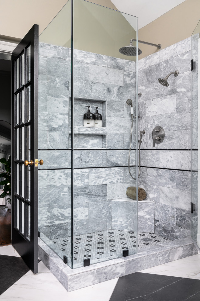 Freestanding bathtub - mid-sized transitional master green tile and marble tile marble floor, double-sink and vaulted ceiling freestanding bathtub idea in DC Metro with louvered cabinets, medium tone wood cabinets, green walls, an undermount sink, marble countertops, a hinged shower door, black countertops and a built-in vanity