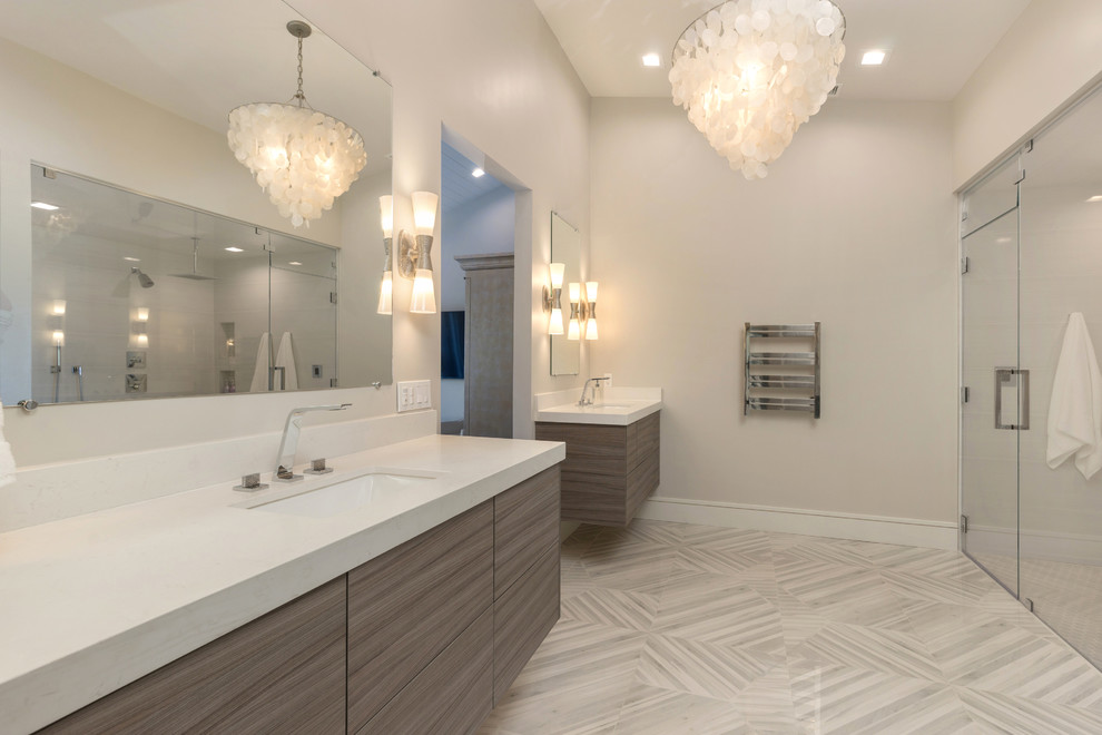 Design ideas for a mid-sized contemporary master wet room bathroom in Orange County with flat-panel cabinets, medium wood cabinets, a freestanding tub, a one-piece toilet, white tile, porcelain tile, white walls, porcelain floors, an undermount sink, engineered quartz benchtops, white floor and a hinged shower door.