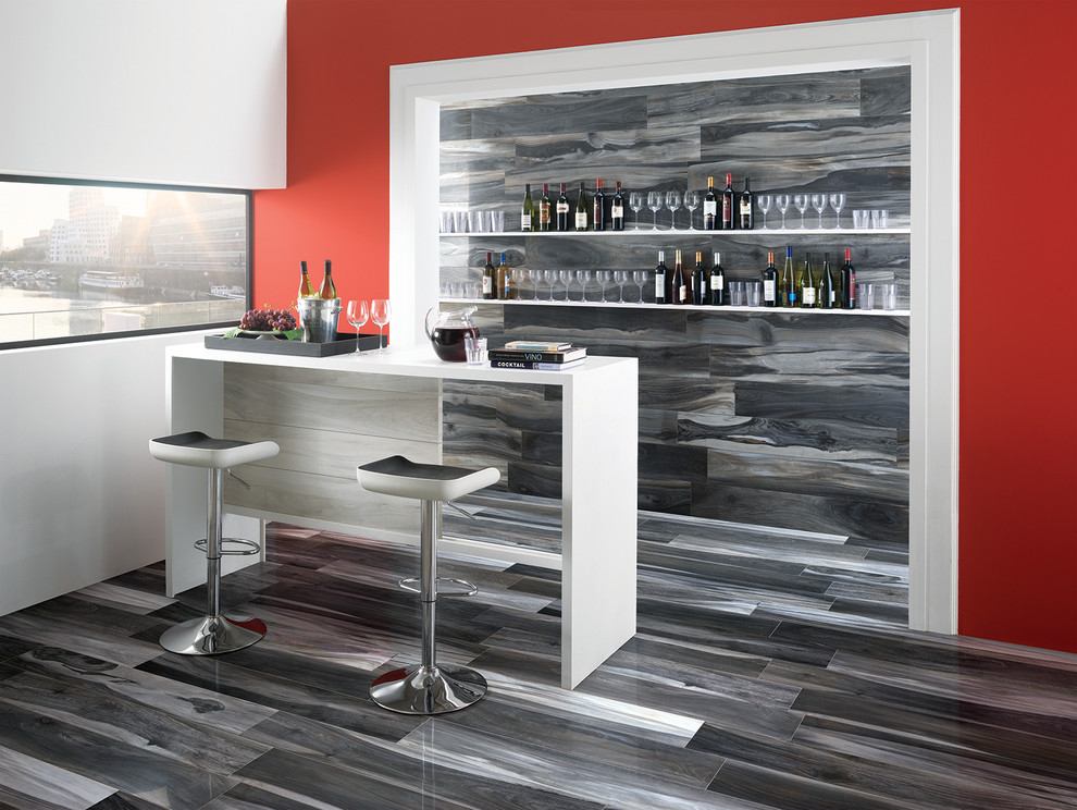 This is an example of a mid-sized contemporary single-wall seated home bar in Belfast with white cabinets and grey splashback.
