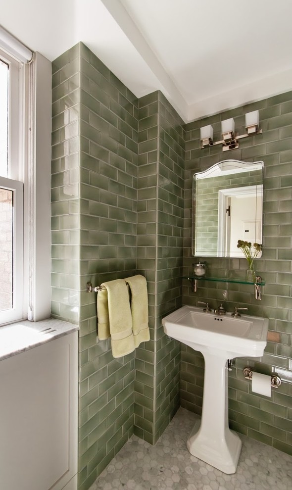 Design ideas for a mid-sized modern master bathroom in New York with a pedestal sink, glass-front cabinets, green tile, green walls and ceramic floors.