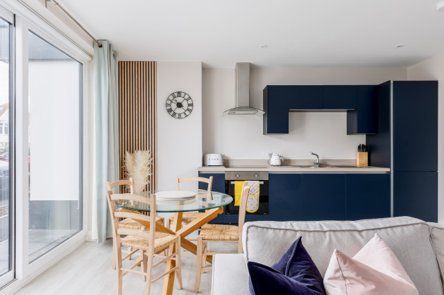 Modern beach themed apartment coastal-kitchen