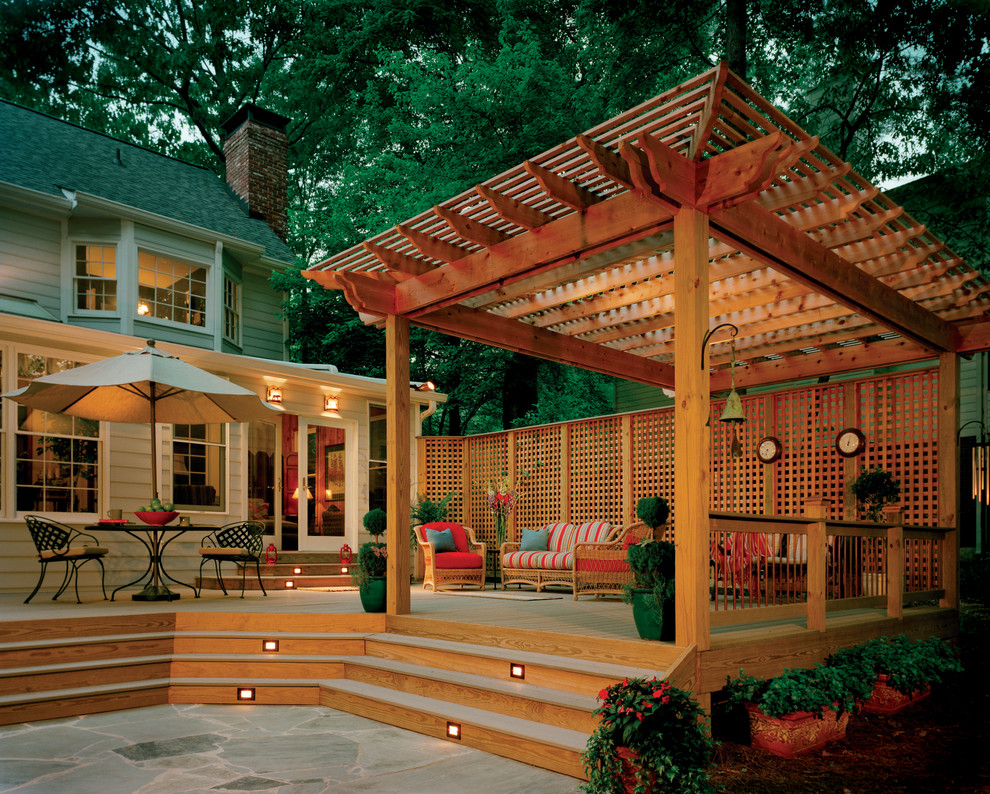 Inspiration for a backyard deck in Atlanta with a pergola.