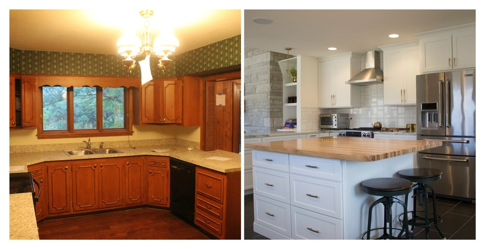 Example of a mid-sized classic kitchen design with a farmhouse sink, white cabinets, white backsplash, stainless steel appliances and an island