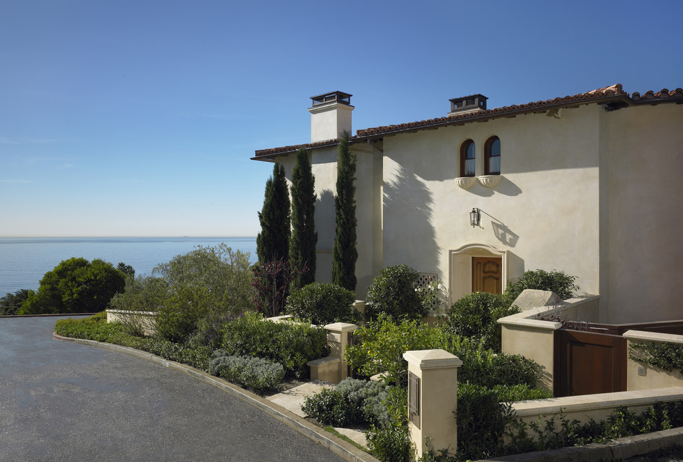 This is an example of a mediterranean two-storey exterior in Los Angeles.