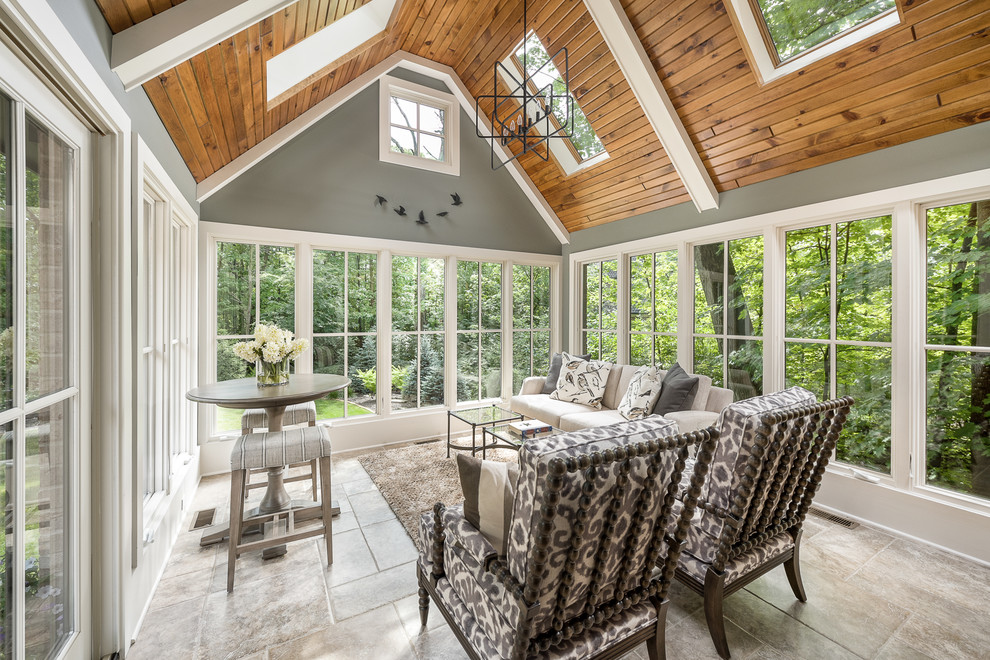 Inspiration for a traditional sunroom in Chicago with a skylight and grey floor.