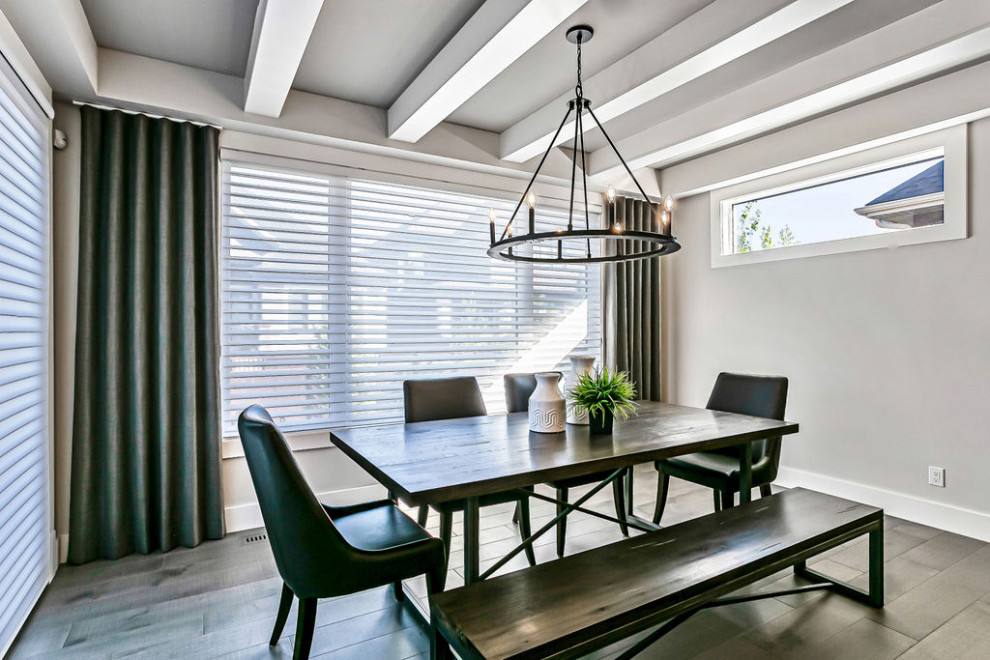 Inspiration for a transitional light wood floor and gray floor kitchen/dining room combo remodel in Calgary with gray walls