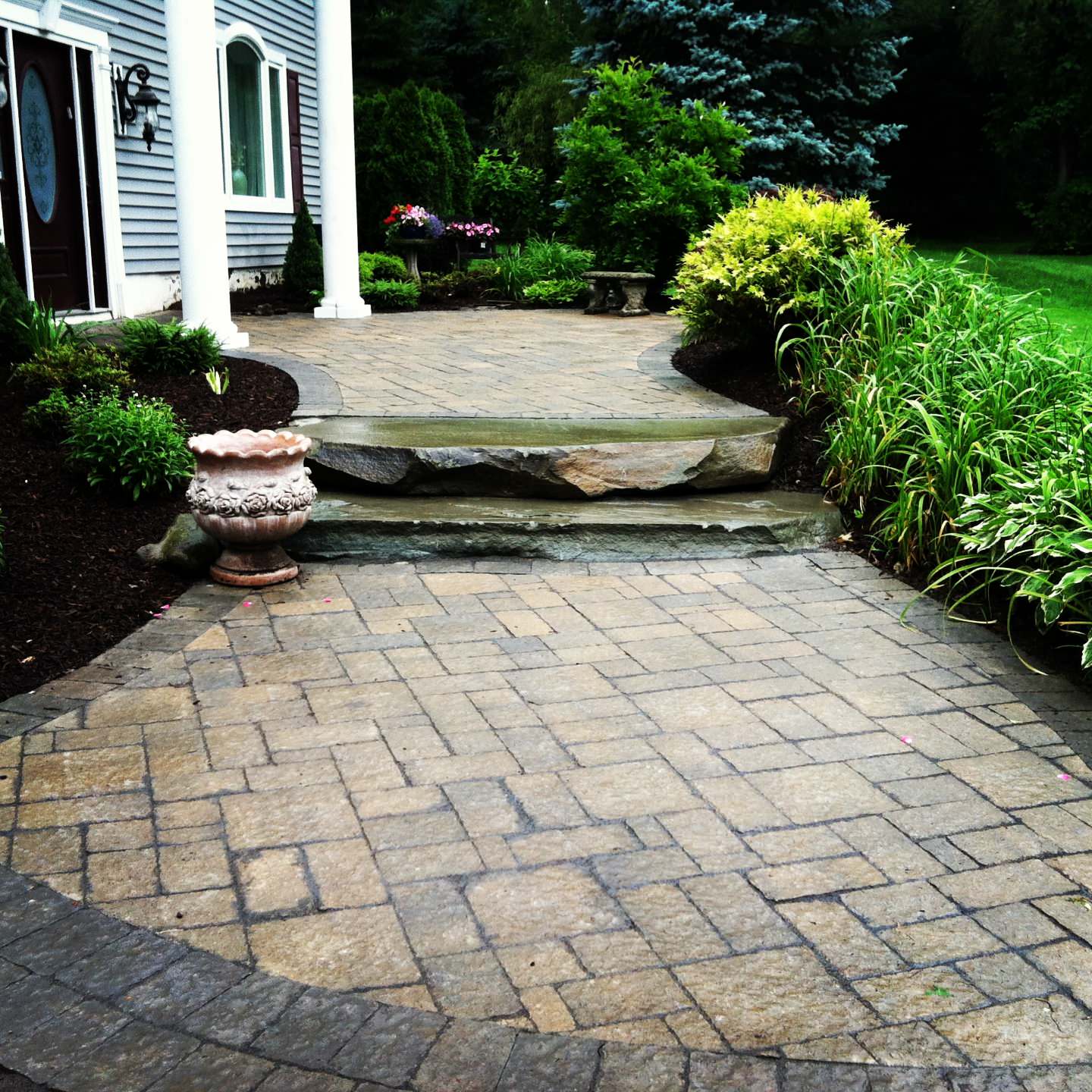 paver walkway with natural fieldstone steps