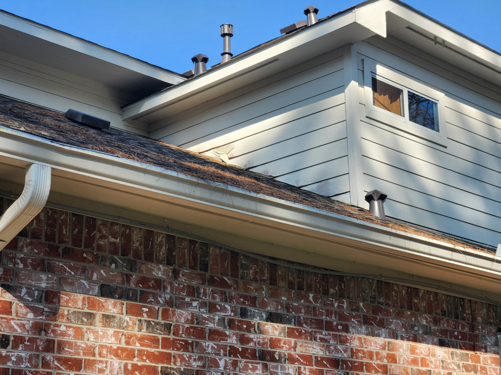 Cemplank Siding damaged because it was too close to the roof.