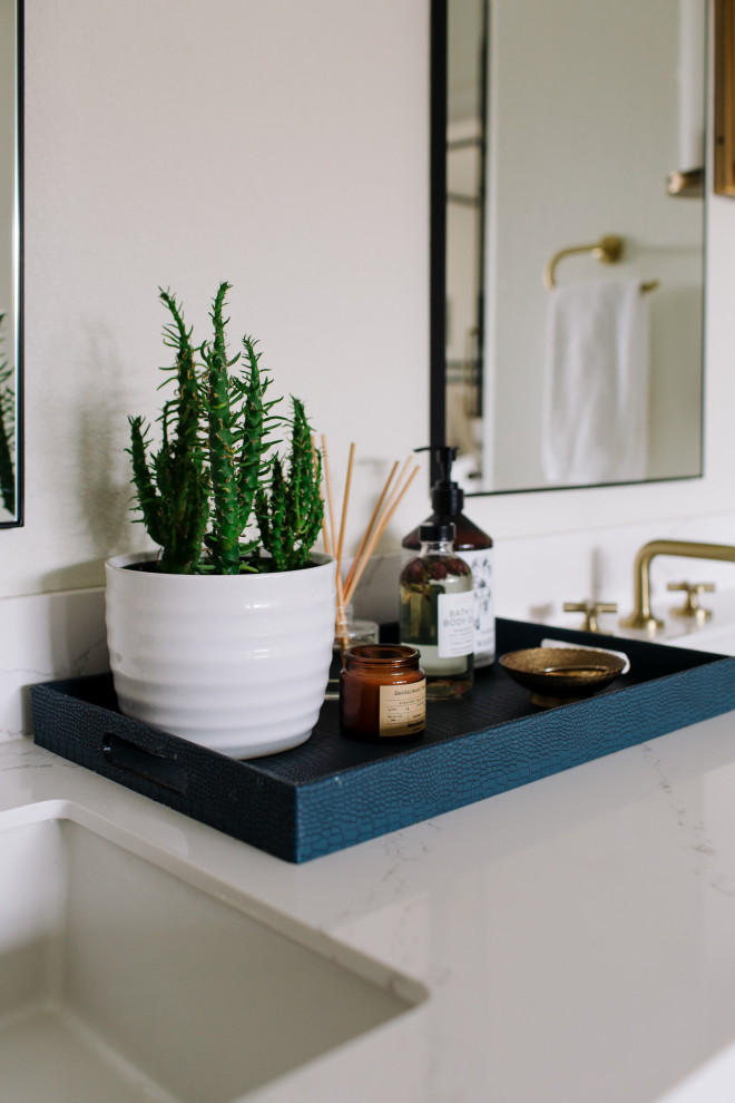 Transitional double-sink bathroom photo in Dallas with marble countertops, white countertops and a built-in vanity