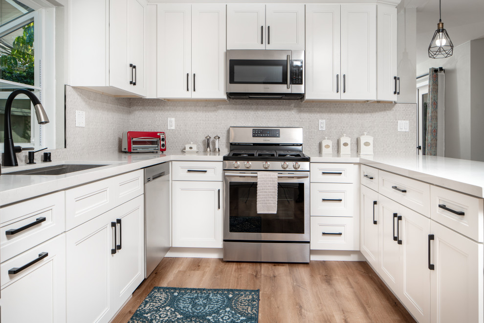 Example of a mid-sized transitional kitchen design in San Diego